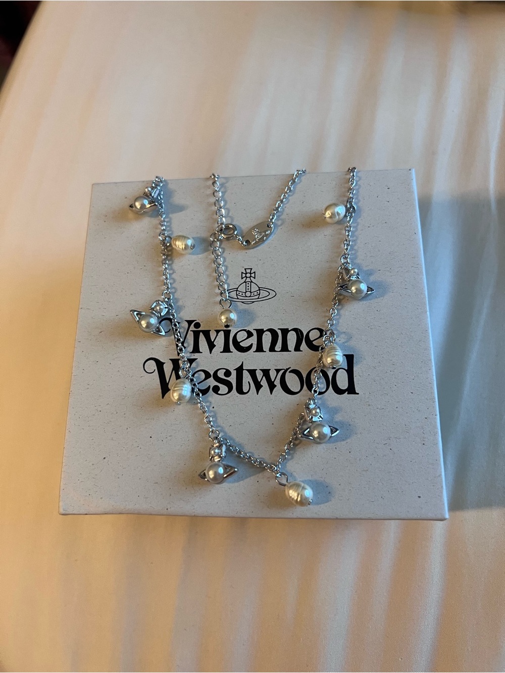 Vivienne Westwood Claude Emiliana Silver and White Pearl Charm Necklace